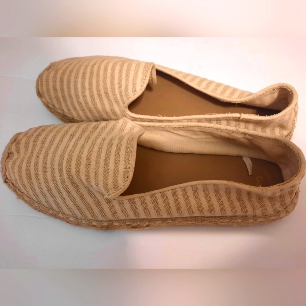 Neutral striped slip ons
